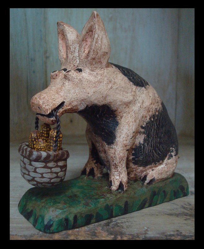 Seated Pig with basket